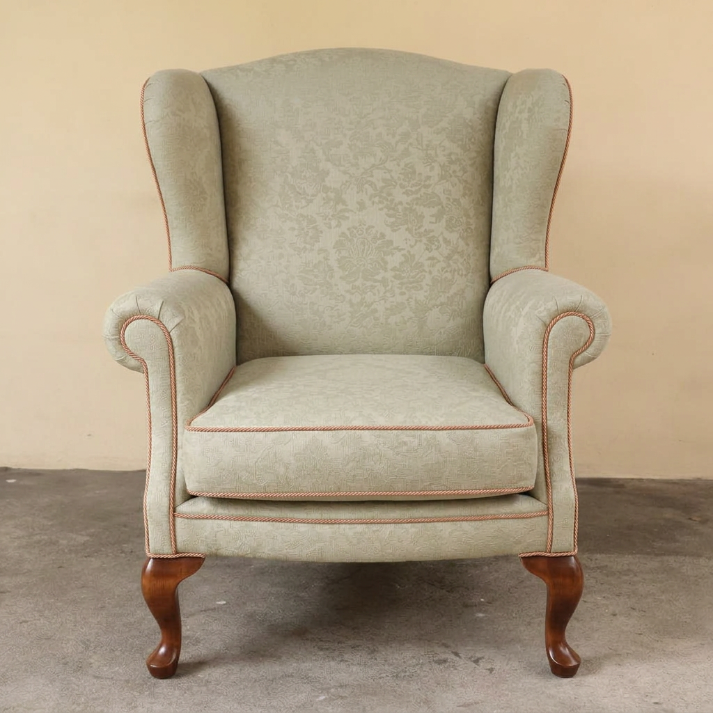 After restoration — Wing chair · Sage linen with copper piping