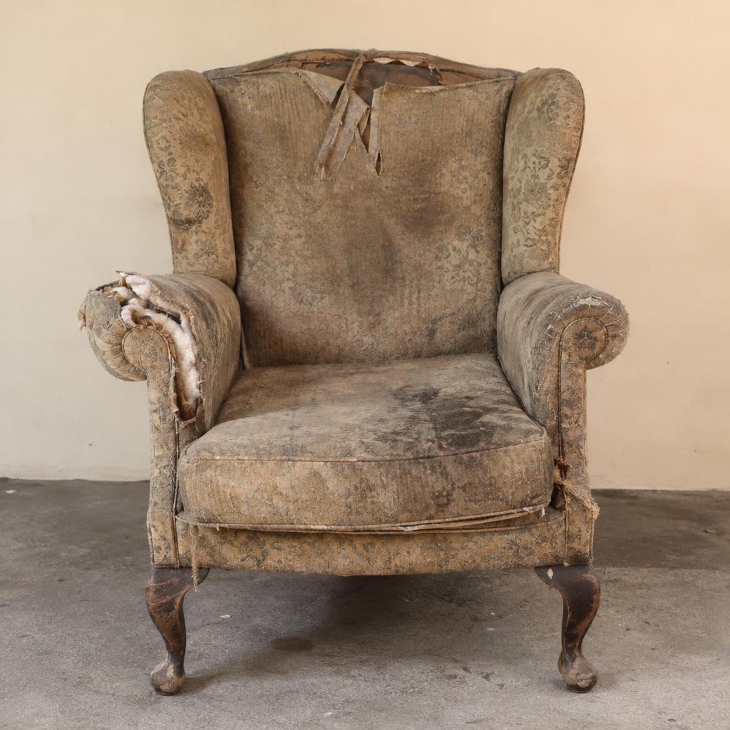 Before restoration — Wing chair · Sage linen with copper piping